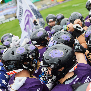 Spieler der Frankfurt Galaxy bei Motivations Ansprache